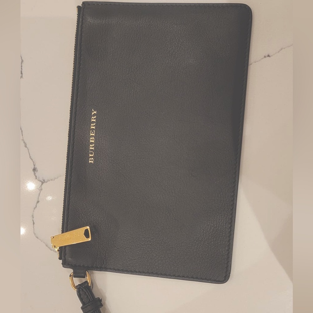 Authentic Burberry wristlet.